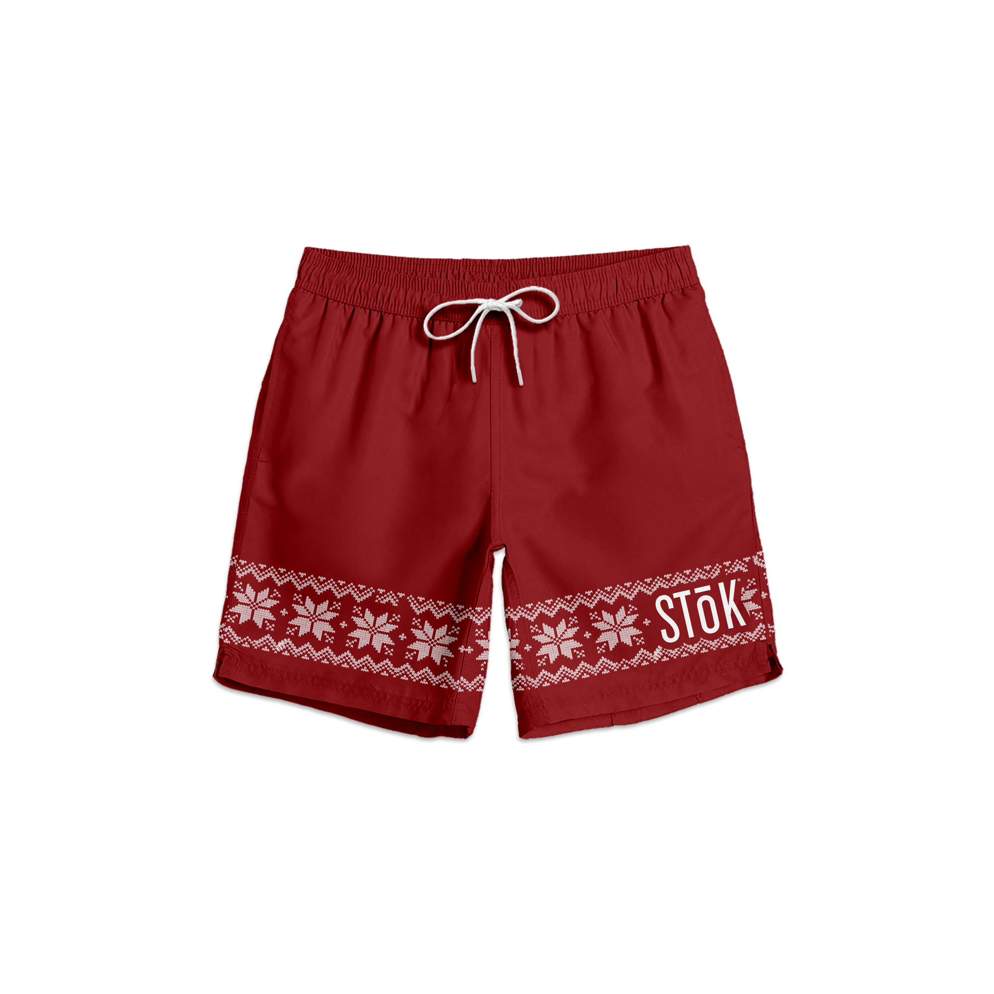 The front of red swim trunks with a strip of knitted pattern design featuring white snowflakes and geometric shapes across the bottom of the legs. The Stōk logo is displayed in white on the left leg strip of pattern, maintaining a clean and simple contrast against the intricate design. There is a white shoelace like tie closure on the front of the waistband.